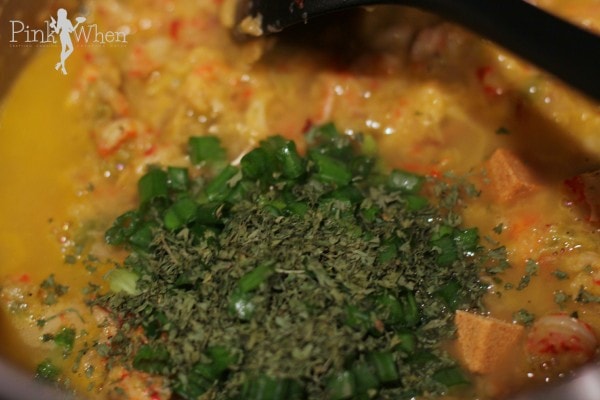 Crawfish Etouffee Adding green onion tops and parsley