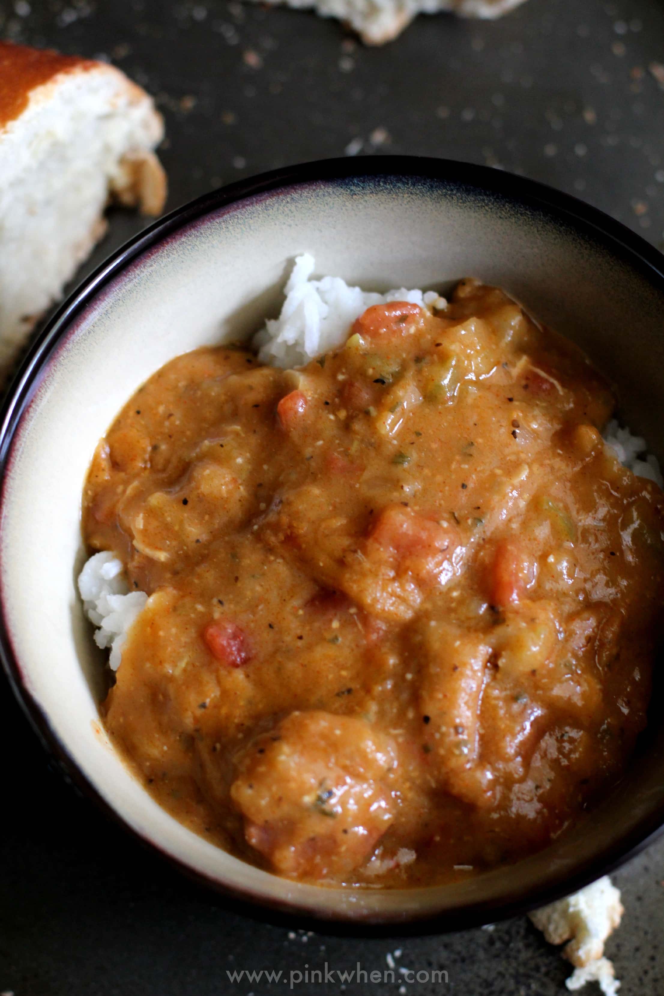 authentic easy gumbo recipe in a bowl with bread on the side