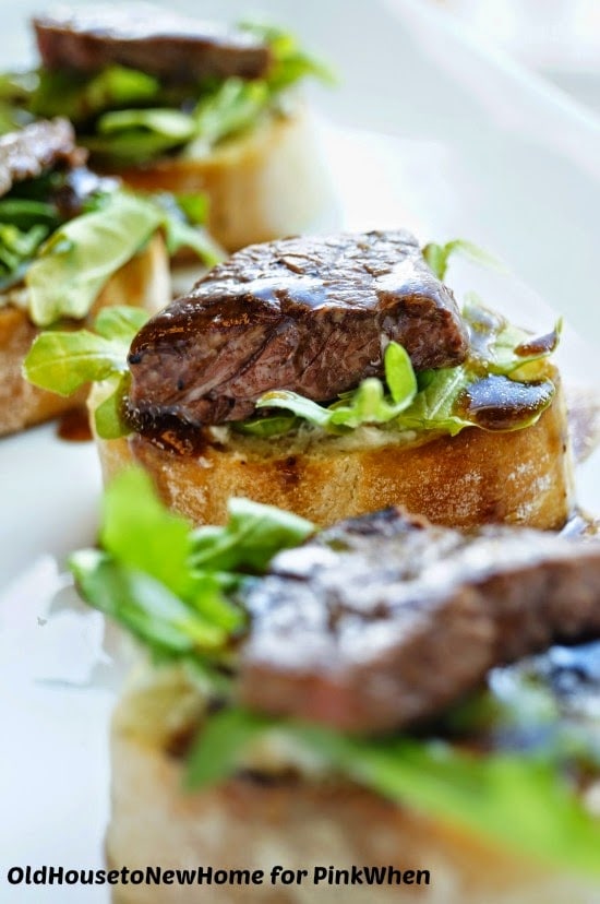 Balsamic Beef Crostini with Herbed Cheese and Arugula