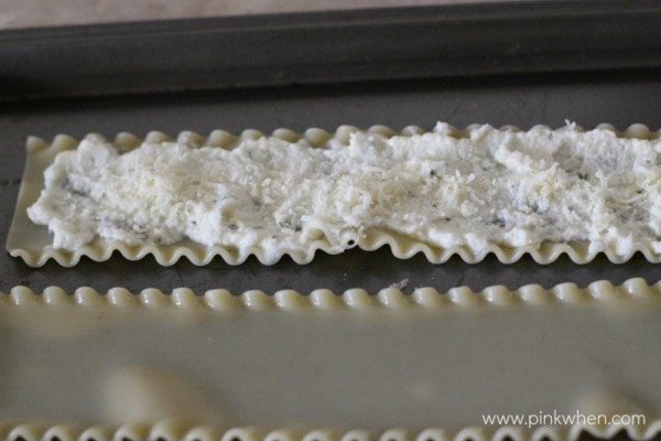 Lasagna noodles covered with cheese mixture.