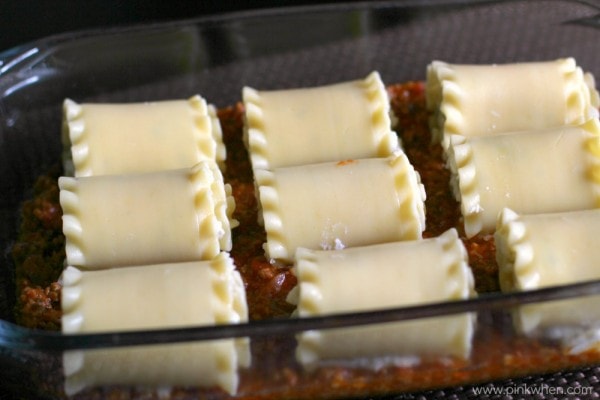 Lasagna Rolls placed onto meat mixture. 