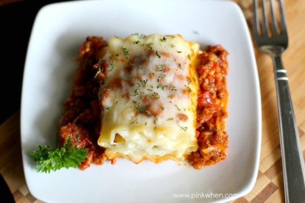 Lasagna Rolls on a white dish for serving. 