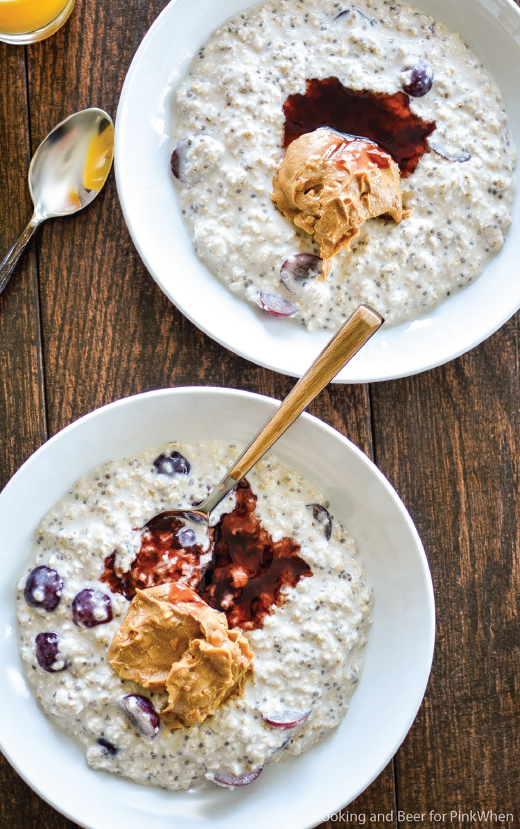 PB & J Overnight Oatmeal in bowls on a table. 