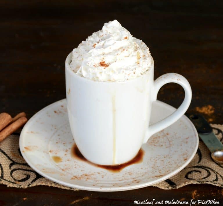 This creamy Cinnamon Vanilla Hot Chocolate topped with whipped cream is the perfect drink to warm you up on those cold, winter nights. #hotchocolate #vanillahotchocolate
