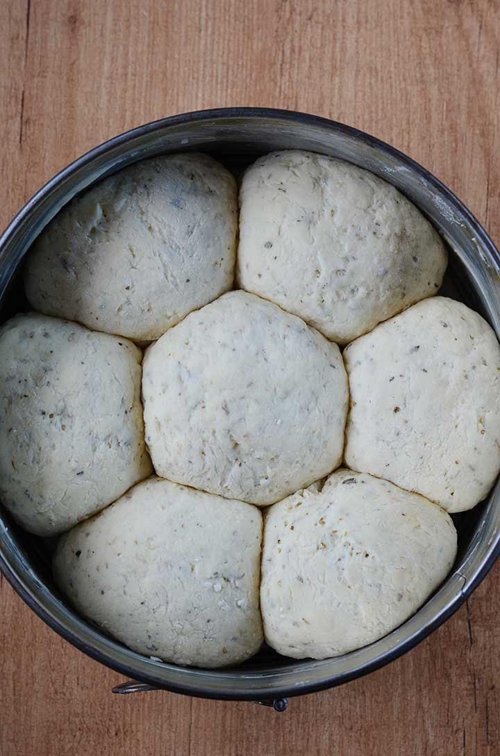 This gluten free garlic herb dinner rolls recipe is bursting with flavor! They’re crusty on the outside, soft and fluffy on the inside.