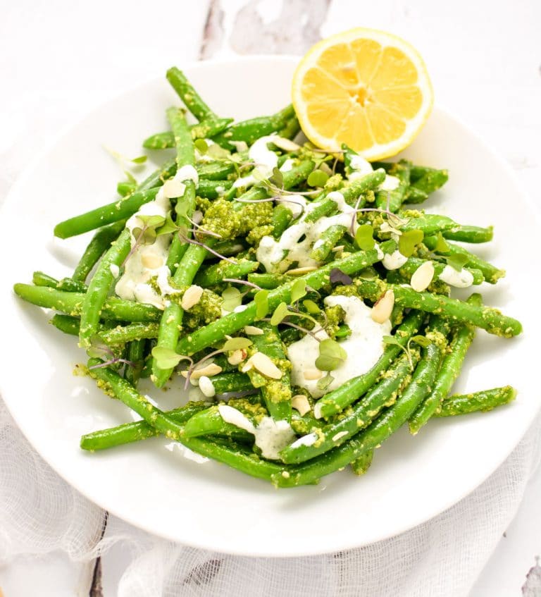 This snap pea and green bean salad with arugula pesto is summertime freshness on a plate. It's the perfect side dish for all of your outdoor gatherings!