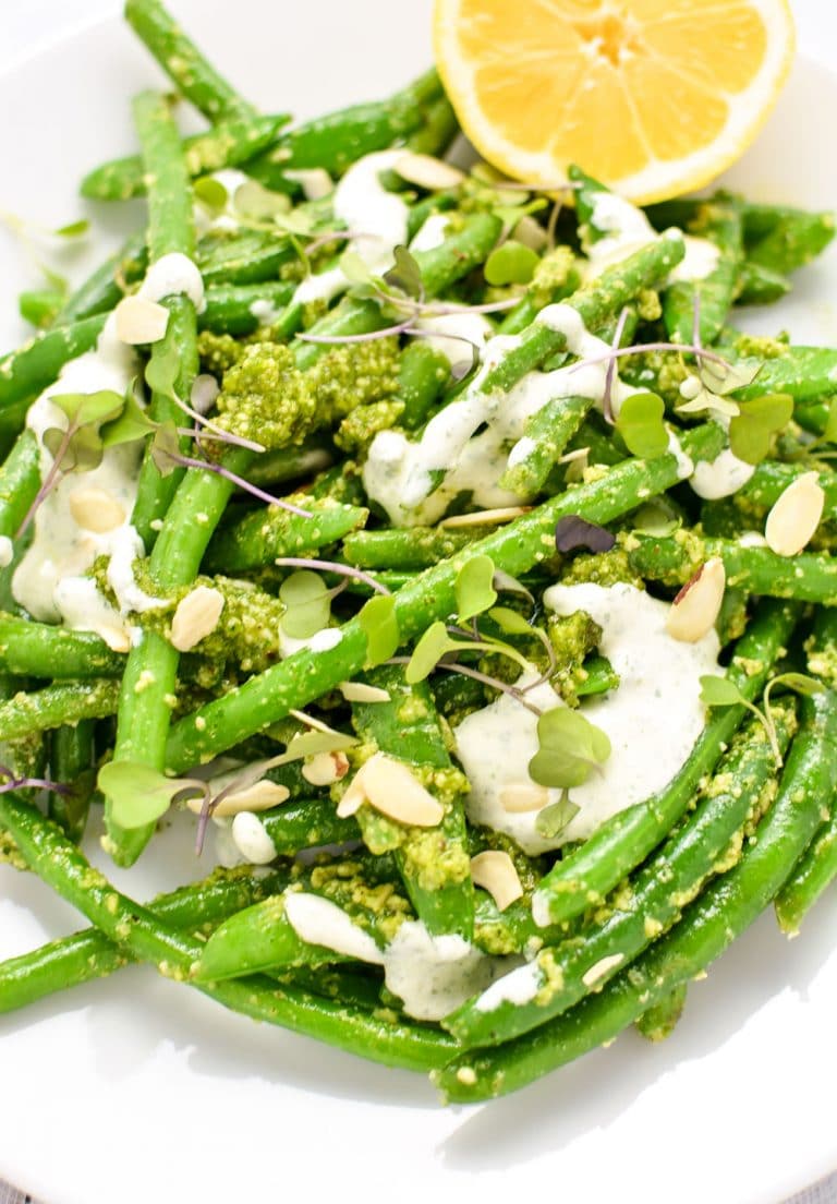 This snap pea and green bean salad with arugula pesto is summertime freshness on a plate. It's the perfect side dish for all of your outdoor gatherings!