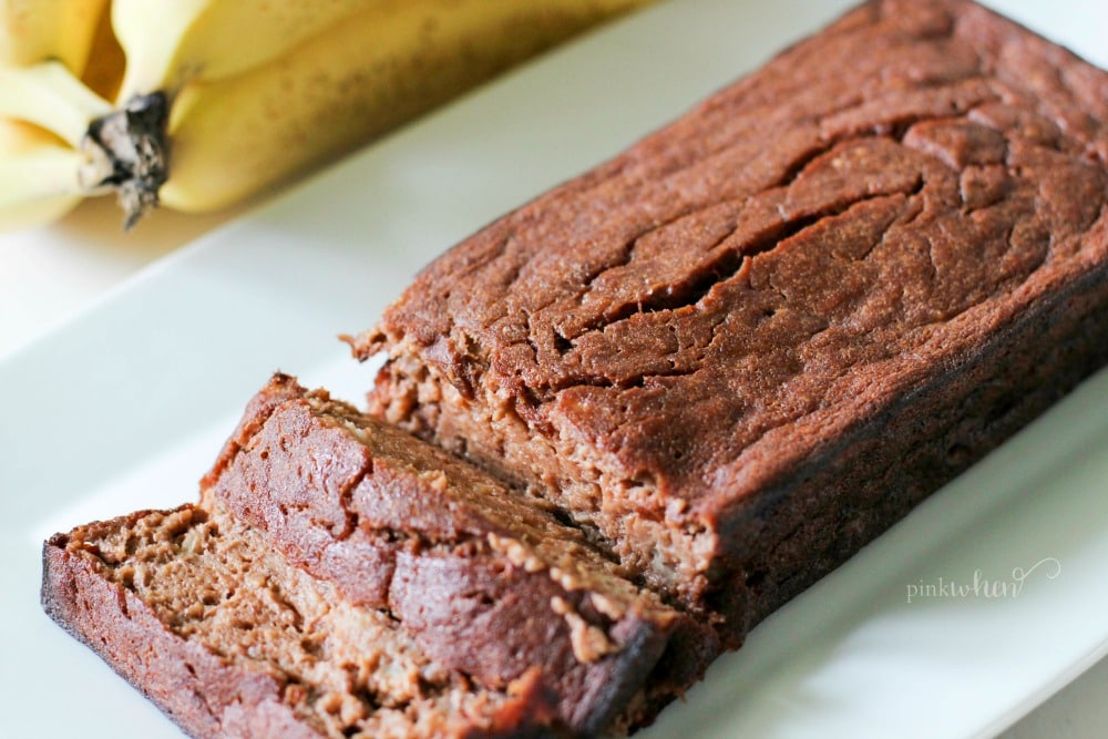 chocolate banana bread on a white serving dish
