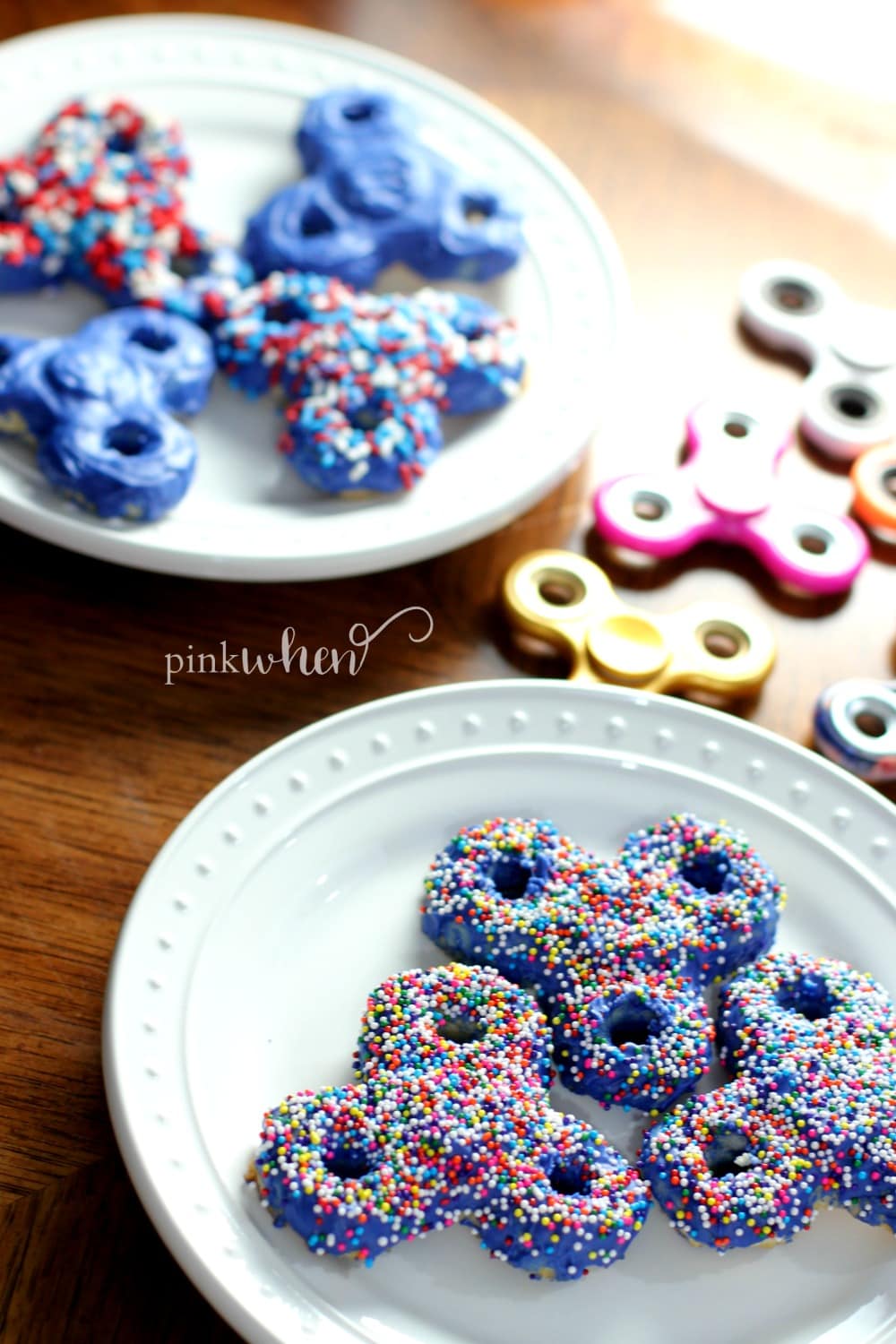 Fidget spinner cookies on white plates