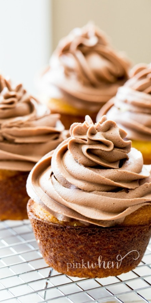 These delicious Easter themed cupcakes are topped with a Nutella buttercream frosting and have a hidden Cadburry egg inside!