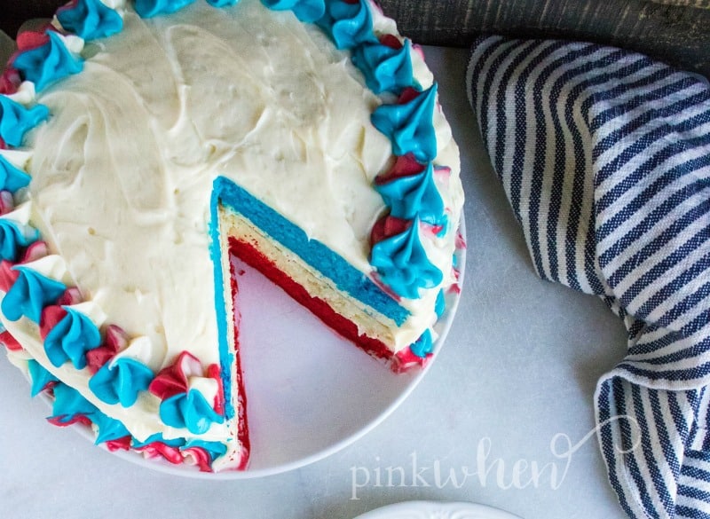 This is such a fun and easy dessert to bring to your summer festivities! This Red White & Blue Patriotic Layer Cake is sure to have everyone excited about summer. 