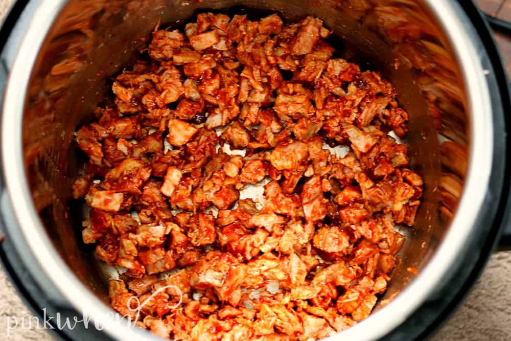  This bbq pork recipe is easily one of our favorites lately - it's SO GOOD! It's even better that it's a bbq pulled pork instant pot recipe so it makes dinner quick and easy. It's savory, sweet, and crazy good. It's a bbq pork recipe your entire family is sure to love!