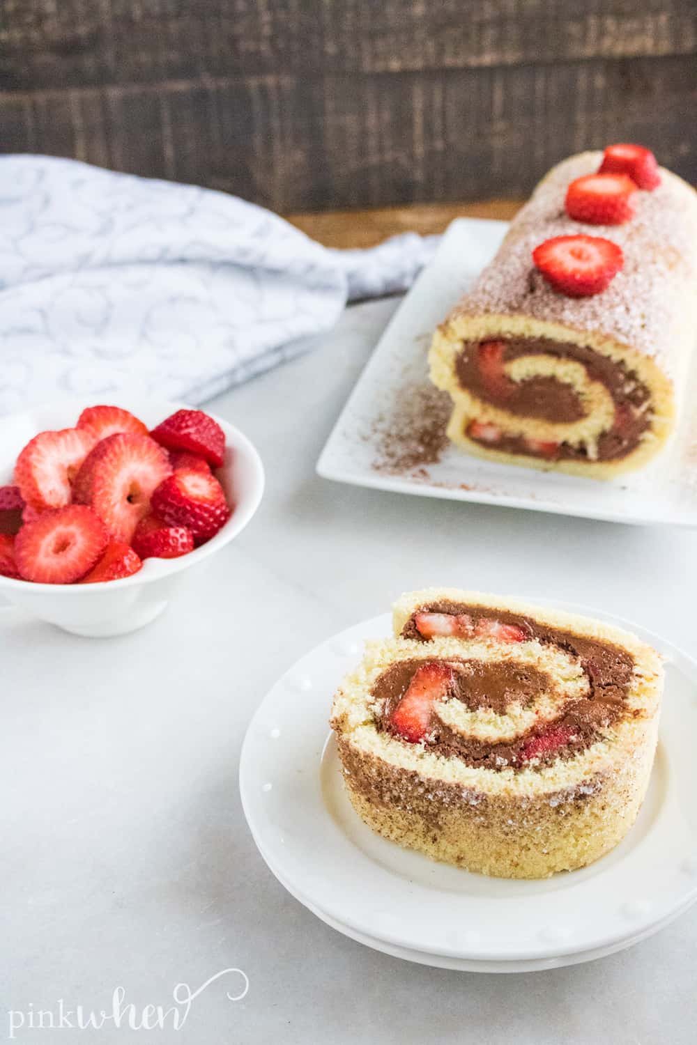 This is one of our new favorite dessert recipes - full of delicious chocolate strawberry flavor! This chocolate ganache cake roll recipe is so sweet, spongey, moist, and delicious! This chocolate roll cake will easily become a favorite in your household!