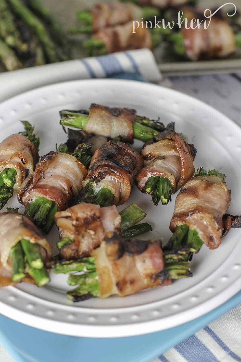 Quick and easy bacon wrapped asparagus. The perfect addition to any menu for the grill. #bacon #asparagus #sidedish #grilledrecipe
