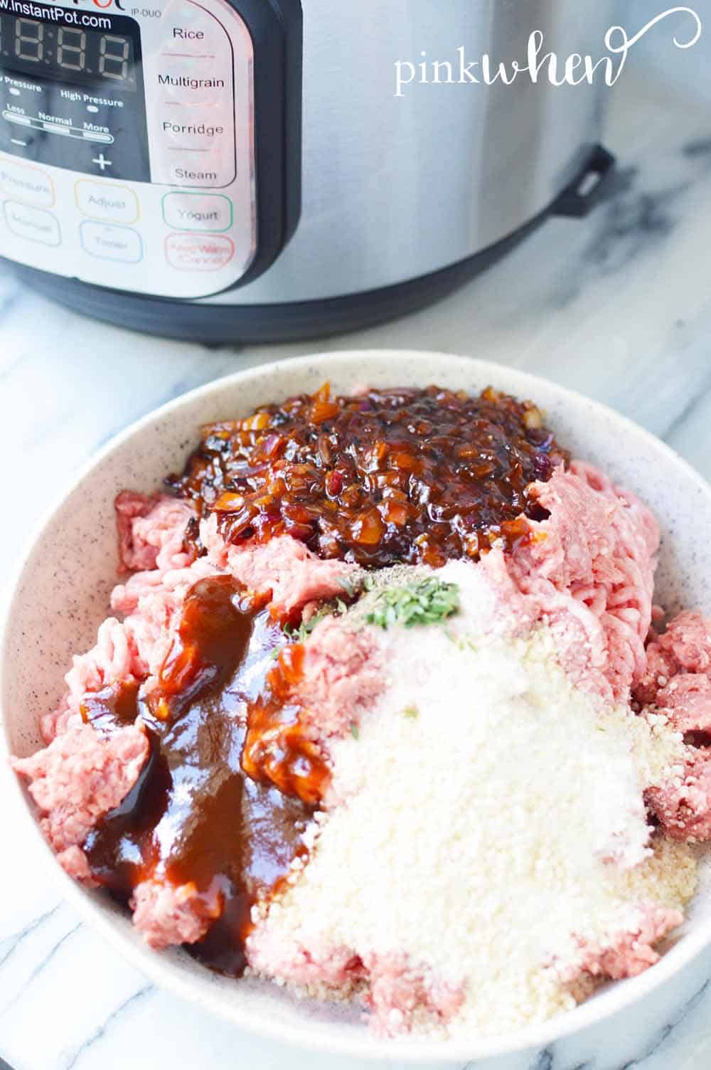 Instant Pot Meatball ingredients on a plate with the Instant Pot in the background.