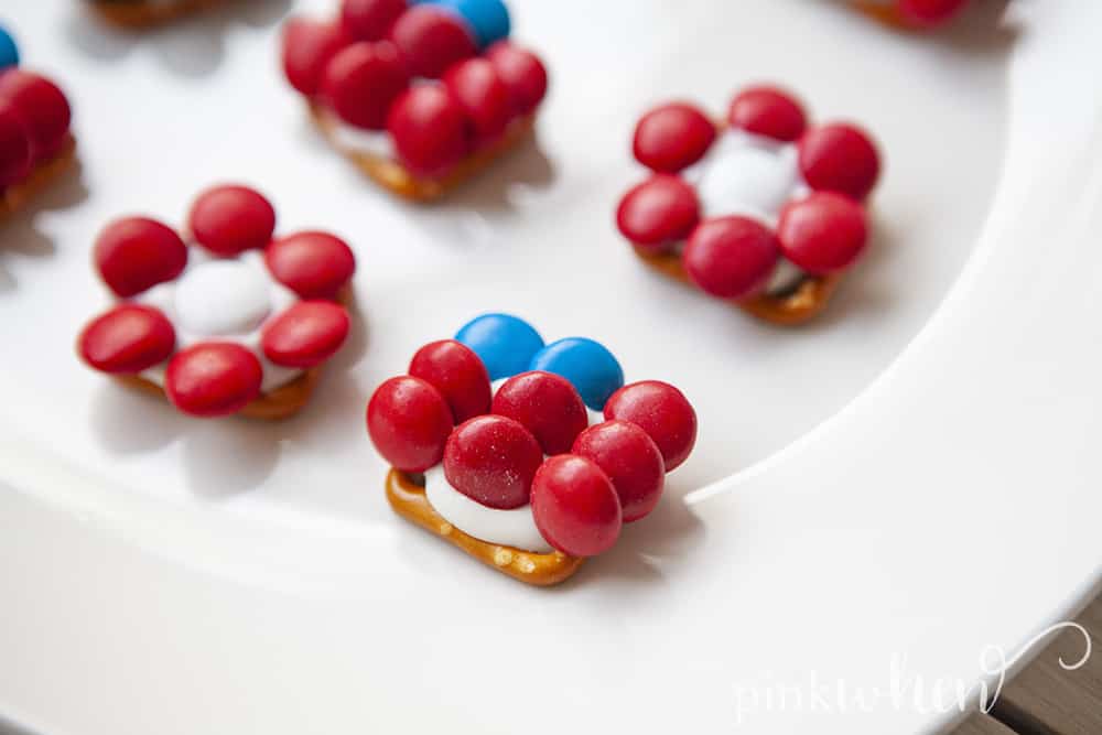 With 4th of July coming up, we have been on the hunt for all kinds of patriotic recipes! You are going to love these patriotic pretzel bites! They're easy to make and very simple, but such a great recipe for kids! These pretzel bites are sure to be a hit.