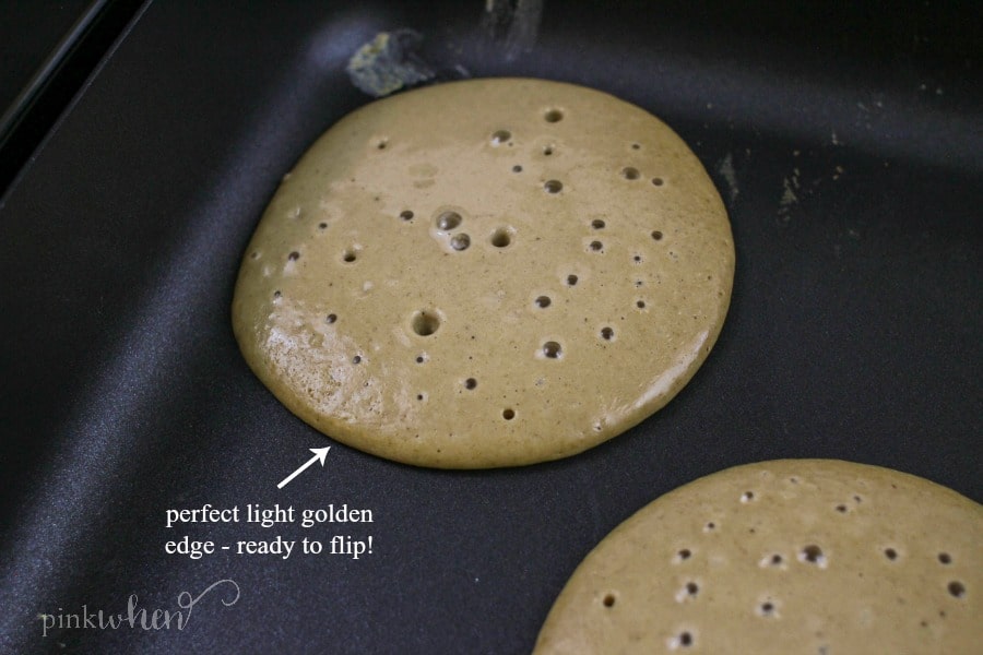 Protein pancakes cooking on a griddle. 