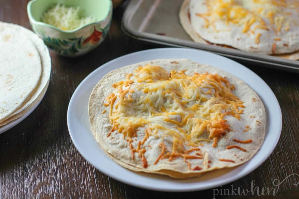 Fajita Chicken Mexican Pizza is one of my FAVORITE tailgating recipes. You can also easily change this up for so many variations. 