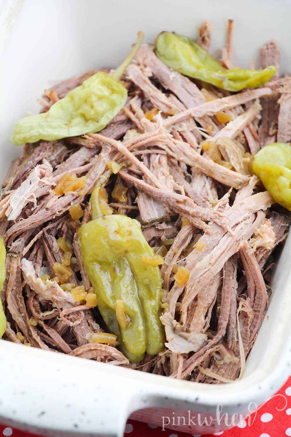 Shredded crock pot roast with onions and peppers. 