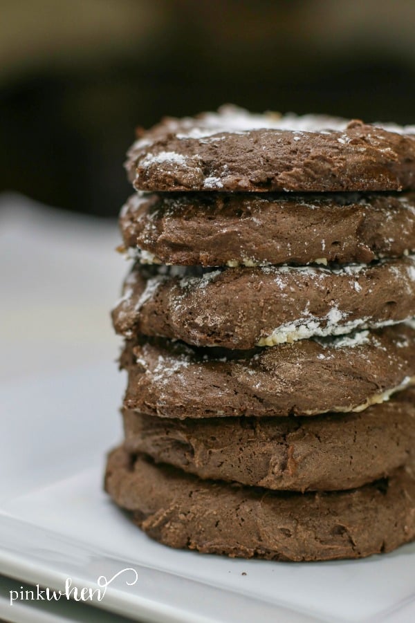 3 Ingredient Cake Mix Cookies stacked on a white plate.