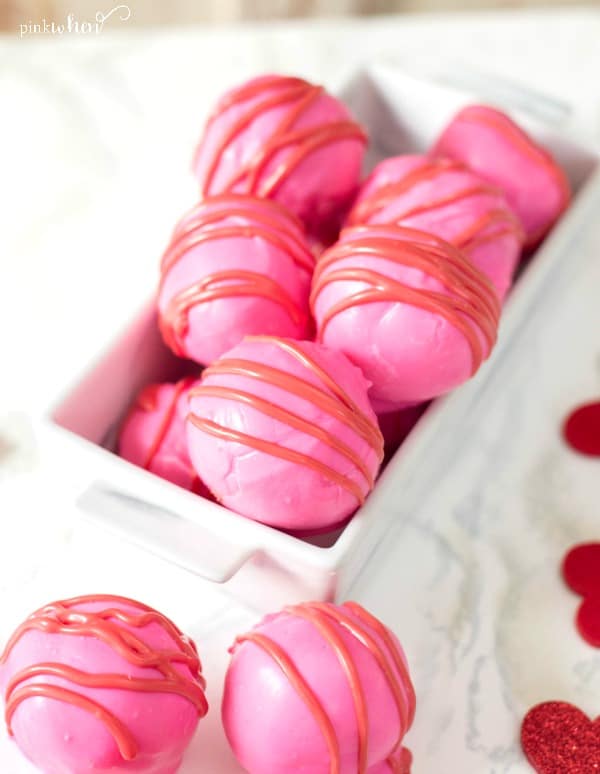 Decorated cake balls in white dish