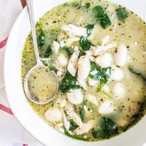 Chicken Gnocchi Soup in a bowl with a spoon.