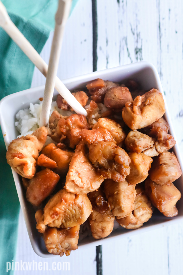 Teriyaki Chicken in a serving dish over rice. 