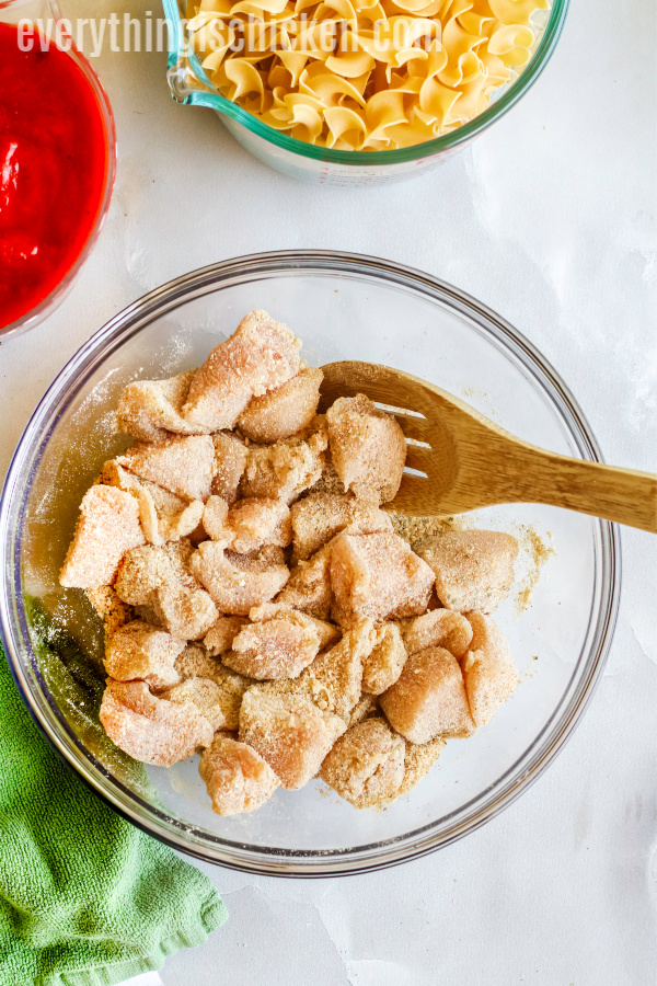 Seasoned chicken for chicken parmesan casserole. 
