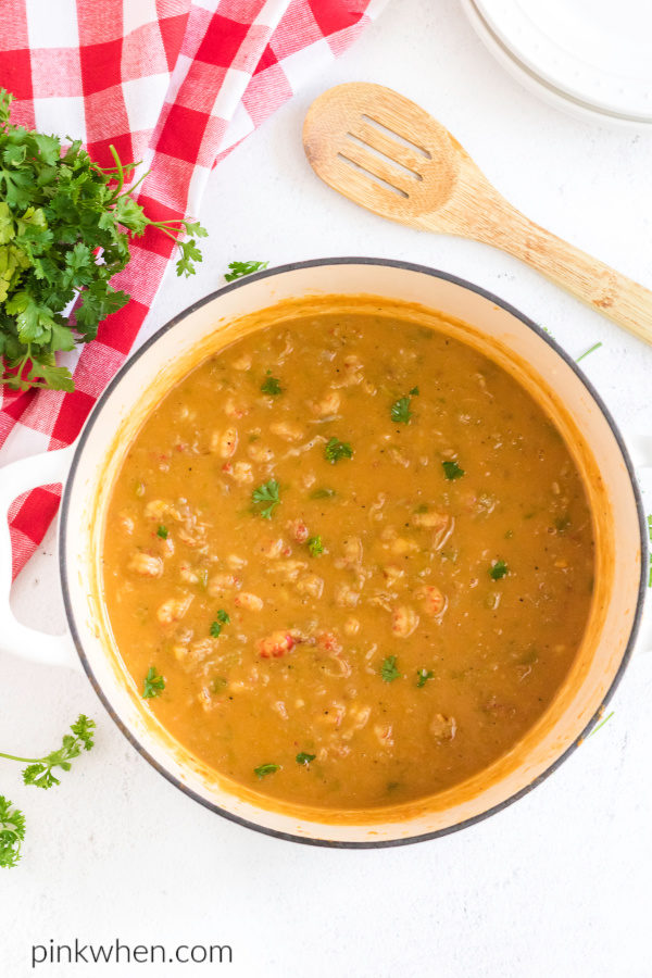 Fully cooked crawfish Etouffee in a large pot. 