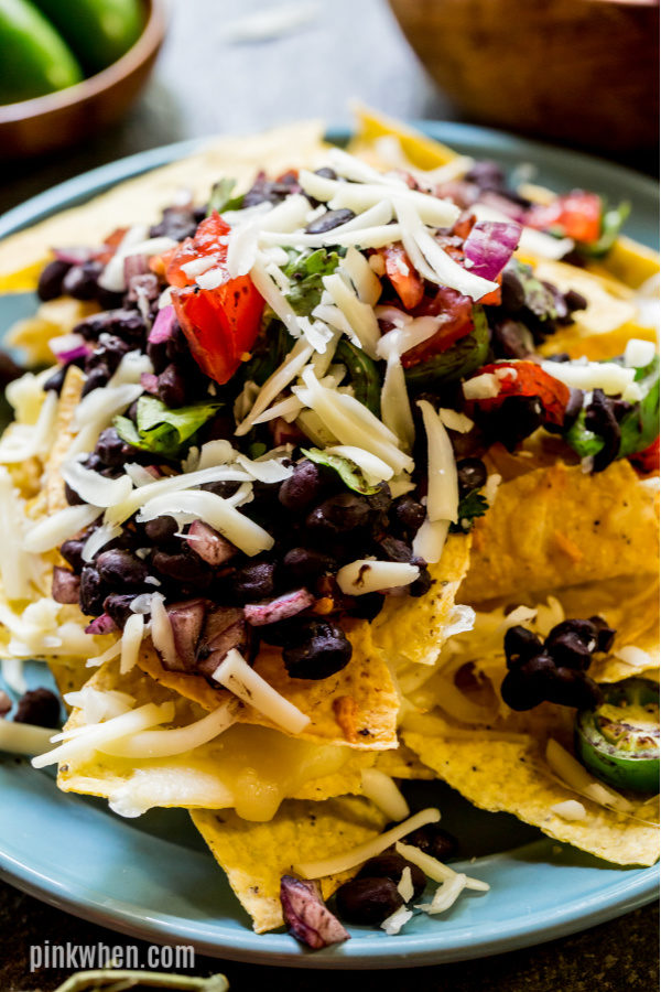 Loaded Instant Pot Nachos on a plate ready to serve. 