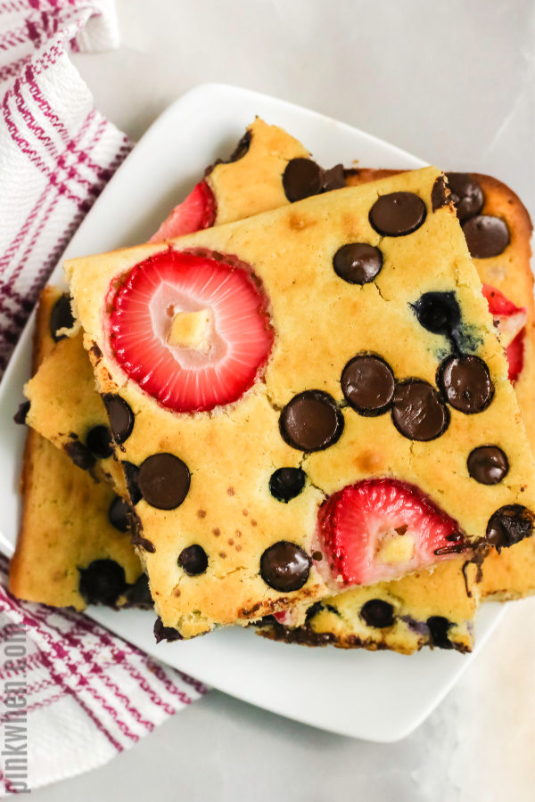 Squares of pancakes from a sheet pan ready to eat.