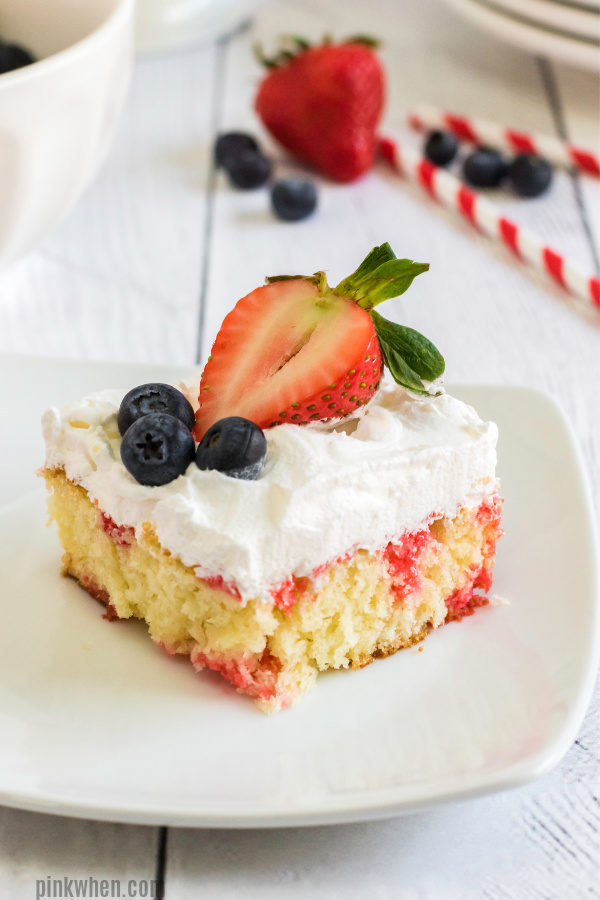 Strawberry Poke Cake cut and reasy to serve. 