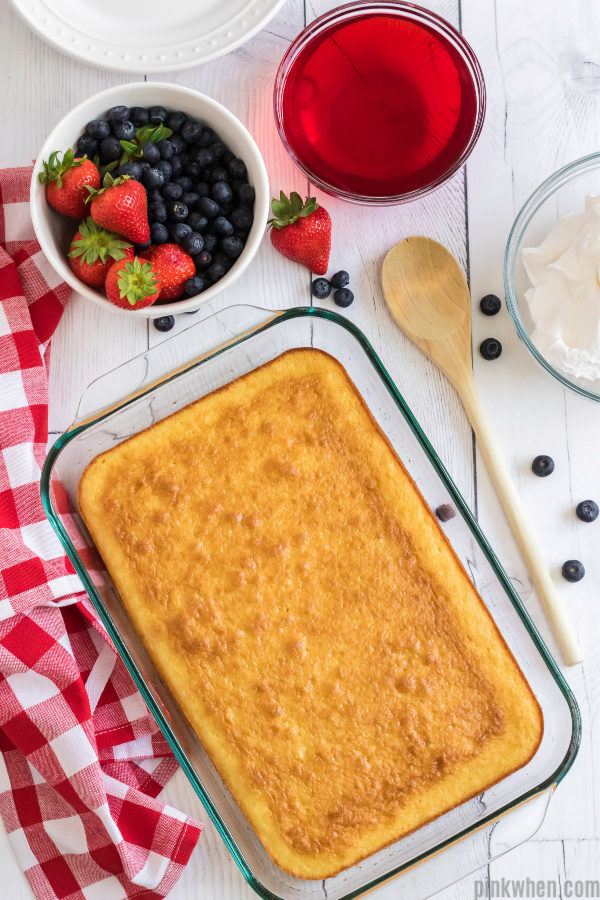 white cake mix baked and ready to be created into a poke cake. 