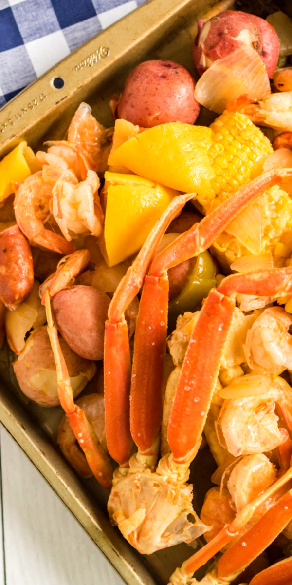 This delicious Cajun Seafood Boil is made with large shrimp, crab legs, red potatoes, fresh corn, Cajun seasoning, crisp vegetables, andouille sausage lemons, and more. It’s an authentic Louisiana-style seafood boil that everyone is sure to enjoy.