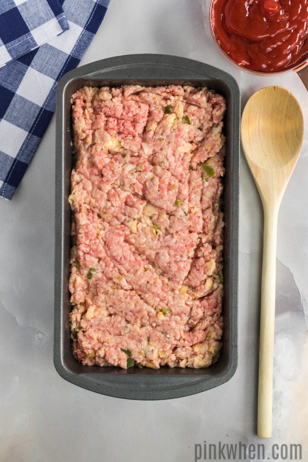Meatloaf lightly packed and ready to bake.