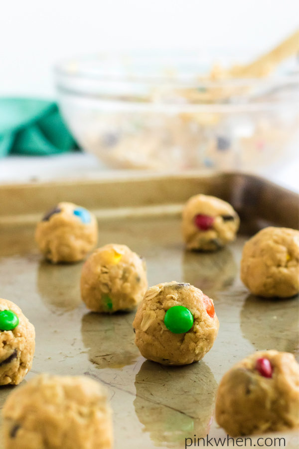 Monster cookie dough rolled into balls, ready to bake. 