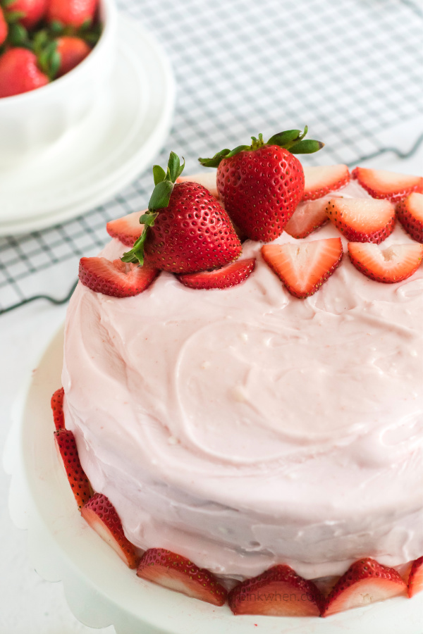 Strawberry Cake with strawberry cream cheese frosting ready to cut and eat. 