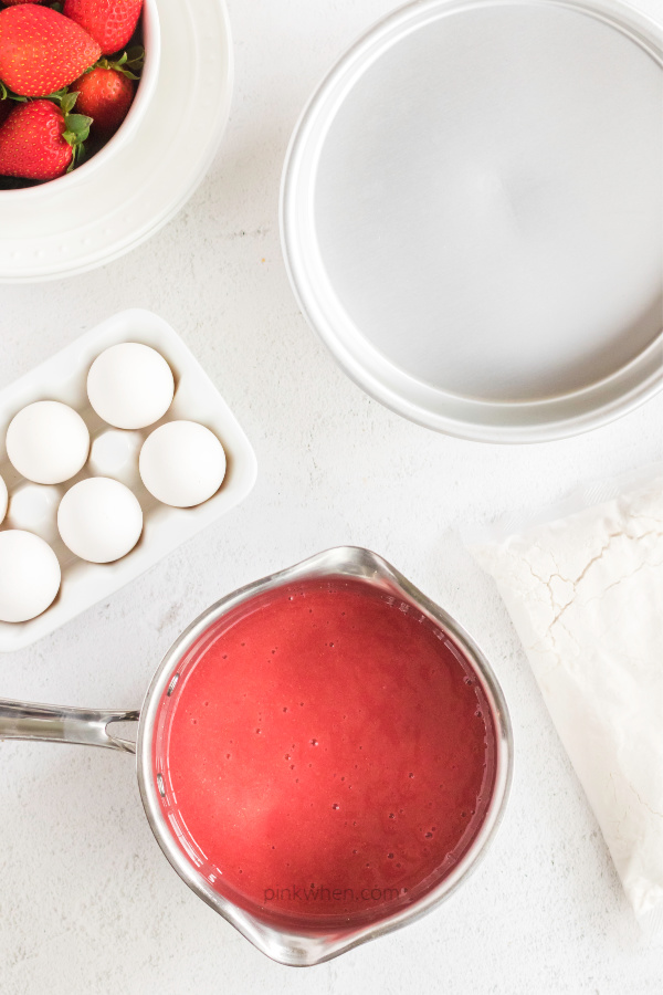 strawberry concentrate in a saucepan.