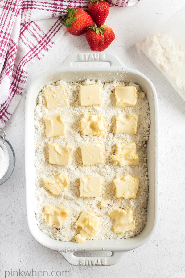 butter sliced over a cake mix. 