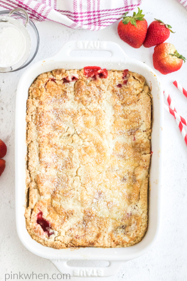 baked strawberry dup cake in a 9 x 13 dish fresh from the oven.