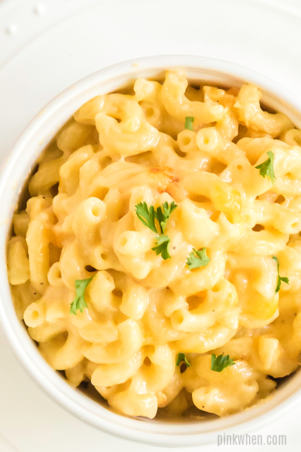 Baked macaroni and cheese in a bowl.