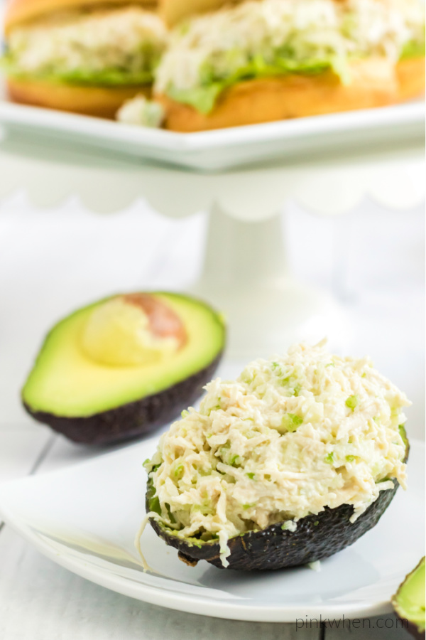 chicken salad served on an avocado.