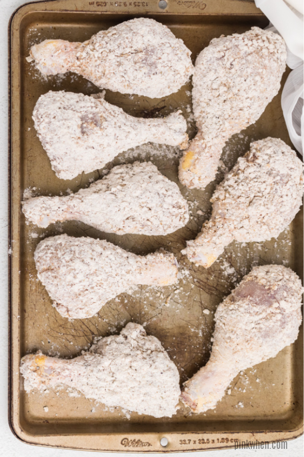 Breaded chicken on a sheet. 