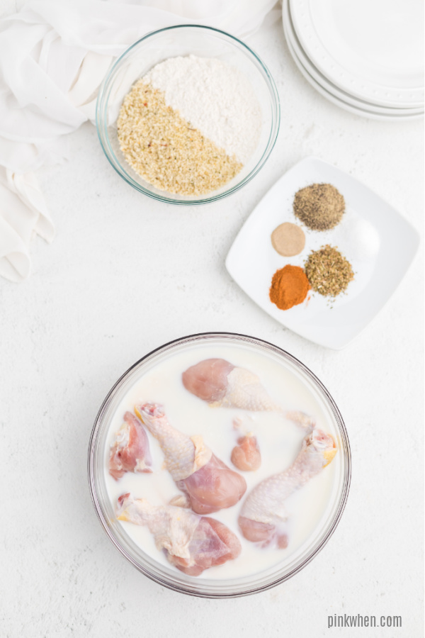 Chicken soaking in buttermilk. 