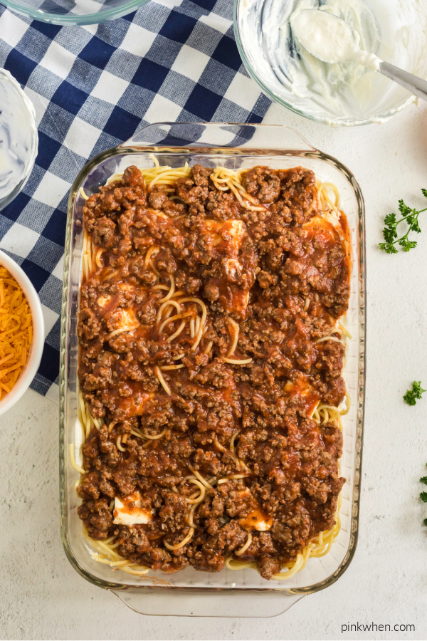 Meat sauce over layers for baked spaghetti. 