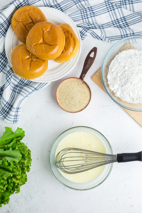 Milk and eggs whisked together in a bowl.