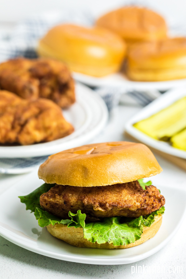 Copycat Chick FIl A Chicken Sandwich on a plate and ready to eat.