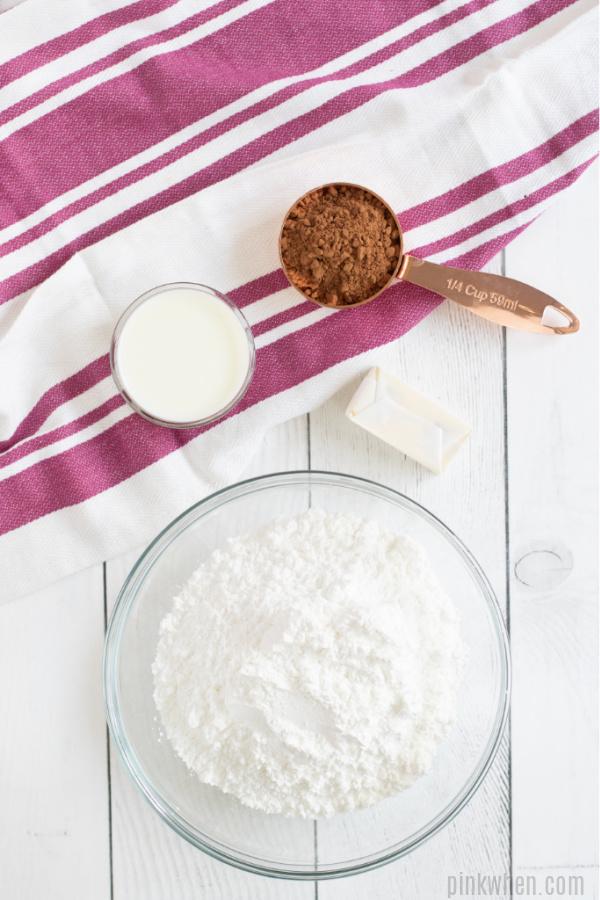 Ingredients needed to make frosting for brownies. 