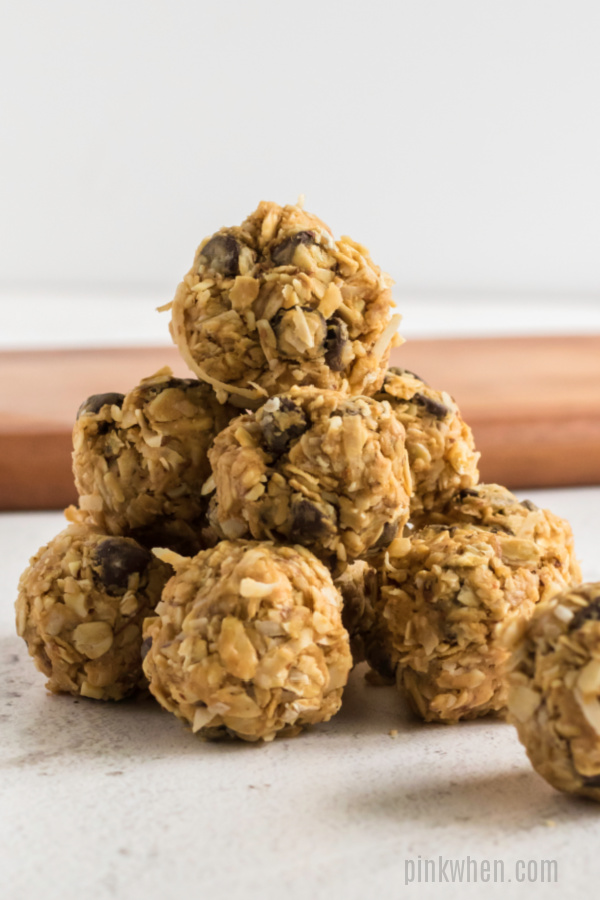 No Bake Protein Balls stacked on a white table.