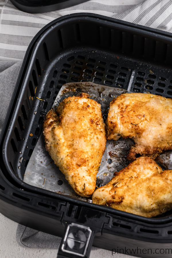 Cooked chicken breasts in an air fryer. 